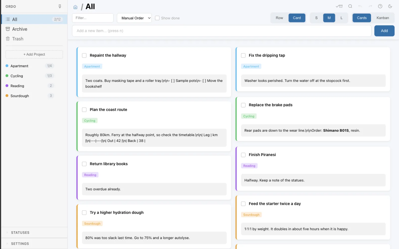 Ordo cards view, showing tasks grouped by project with markdown notes